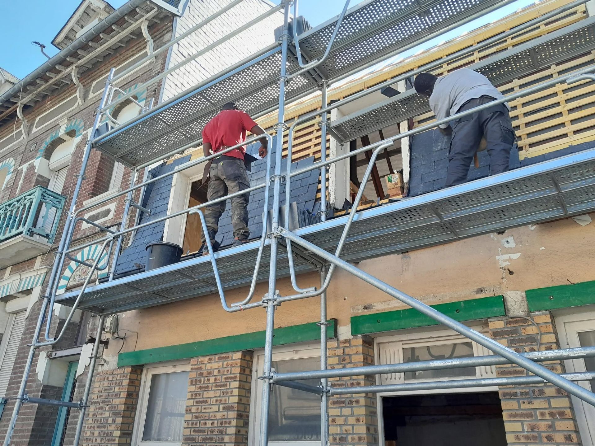 Pose d'ardoise en façade